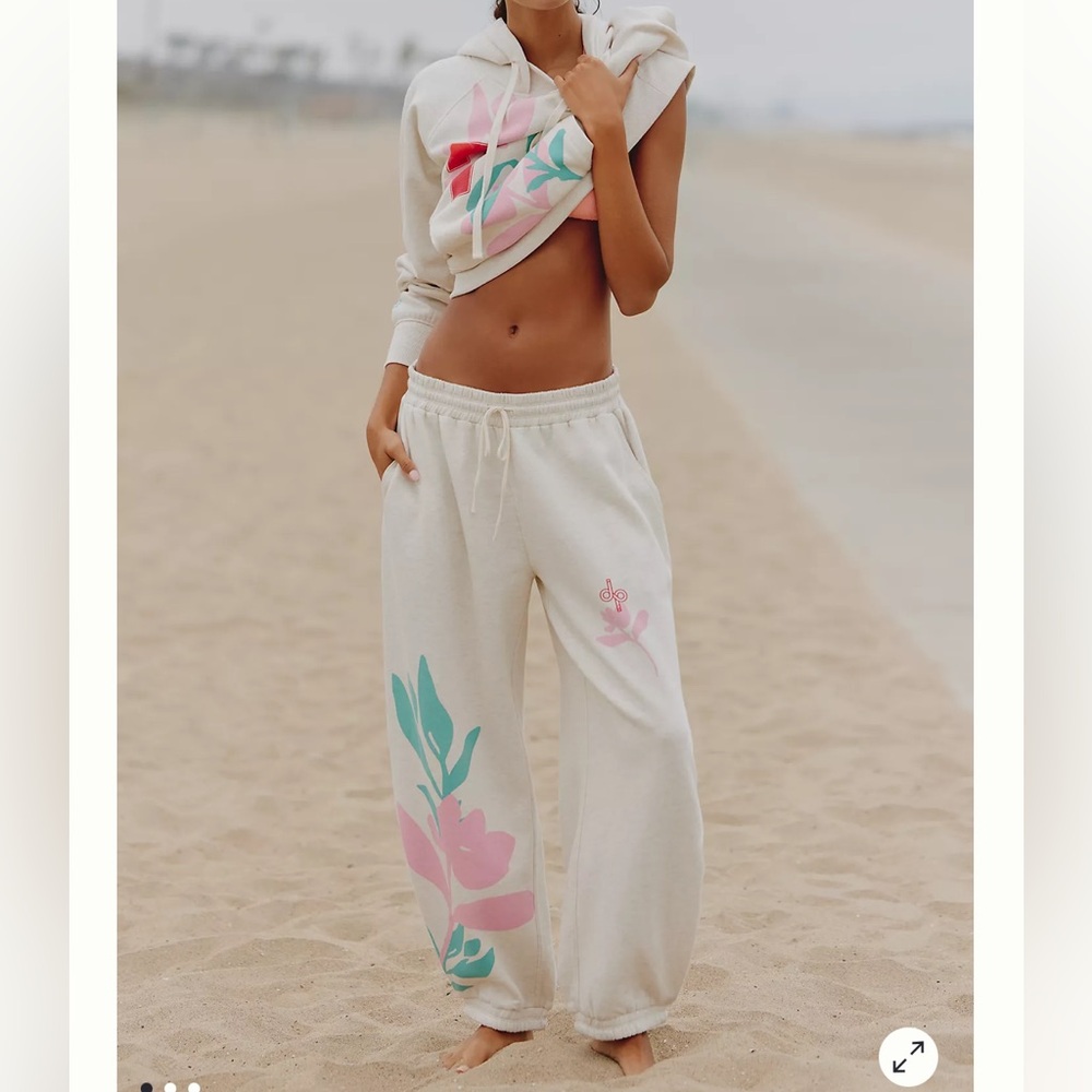 Anthropologie Cream Track Pants with Pink & Teal Floral Print
